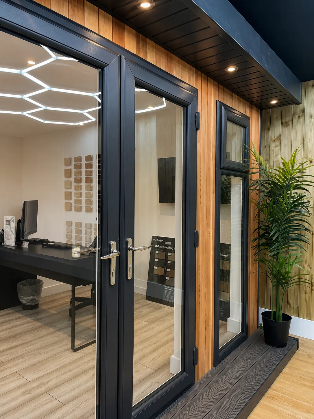 Looking into the showroom past cladding and finish sample boards